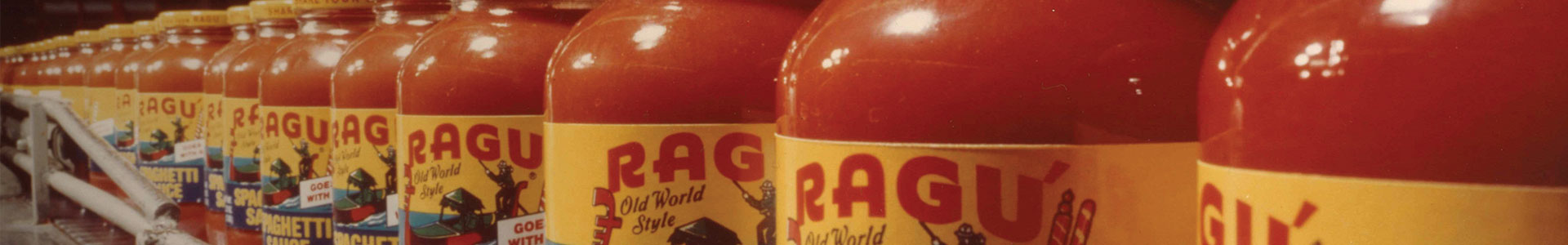 A product line up of vintage bottles of RAGÚ Old World Style spaghetti sauce